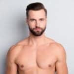 close portrait attractive man content serious wellgroomed