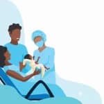 giving birth in hospital with medical team assisting mother and newborn