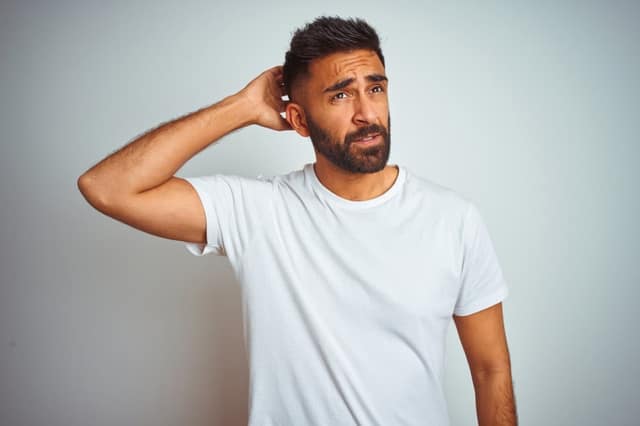 man looking thoughtful and unsure, representing becoming a dad
