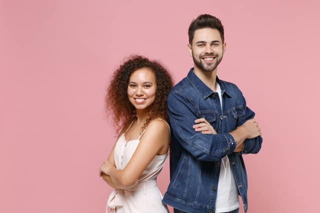 smiling couple friends european guy african