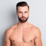 close portrait attractive man content serious wellgroomed