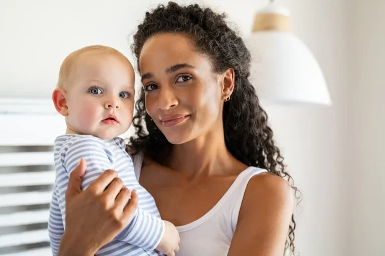 adopt a child concept with a mother holding a baby at home